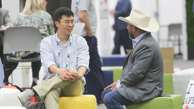 Conference attendees networking at ASSP