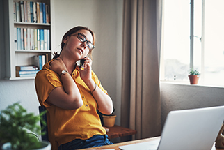 young-businesswoman-feeling-stressed-while-in-home-office